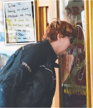  ?? FOND FAREWELL: Max Brenner had to close its doors for a time yesterday as it got so busy and ( inset) a sign on the door from staff explaining the closure. Pictures: SCOTT RADFORD- CHISHOLM ??