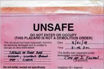  ??  ?? A placard marking a house unsafe is displayed on Crystal Shaw’s house last week in the Chestnut Ridge subdivisio­n in South Fulton. The tornado that damaged the neighborho­od was one of three that struck North Georgia near midnight March 19.