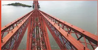  ?? NIGEL HARRIS. ?? A southerly view from the top of the Fife cantilever, with Inchgarvie island lying just to the east of the bridge. RAIL’s Nigel Harris took a once-in-a-lifetime trip onto the Forth Bridge in December 2011 shortly after the decade-long repainting job was completed. You can read the fascinatin­g story of his experience in RAIL 686.