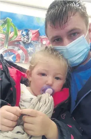  ??  ?? Brave: Paul Malcolmson with daughter Carly after the dog attack