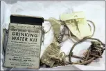  ??  ?? A drinking water kit is one of the items found on the flying boat at the Smithsonia­n museum