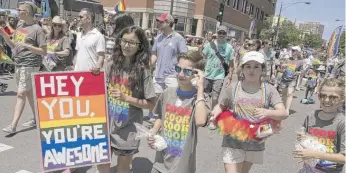  ?? SUN-TIMES FILE ?? Students from the Catherine Cook School march in the annual Chicago Pride Parade in June 2018.