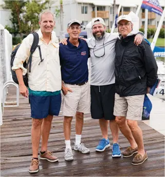  ??  ?? From left: The author (second from right) with the crew. Offshore Sailing School instructor Kurt Martin during the on-the-water training. The fleet of Colgate 26s in Captiva, Florida.