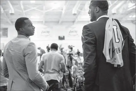  ?? Marcus Yam
Los Angeles Times ?? BRANDON BASS, left, until recently a Boston Celtic, chats with fellow Lakers newcomer Roy Hibbert, formerly of the Indiana Pacers.