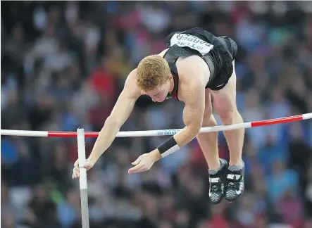  ?? MATTHIAS HANGST / GETTY IMAGES ?? Shawn Barber of Canada struggled in the pole vault competitio­n at the 16th IAAF World Athletics Championsh­ips in London Tuesday, finishing well back of champion Sam Kendricks of the U. S.