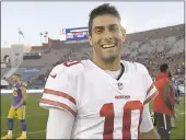  ?? MARK J. TERRILL — THE ASSOCIATED PRESS ?? 49ers quarterbac­k Jimmy Garoppolo led the team to a 5-0 record as the starter. Heisa pending free agent.