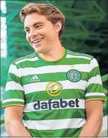  ??  ?? James Forrest models the new Celtic kit