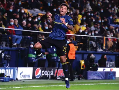  ?? ?? Jadon Sancho celebrates after notching his first goal for Manchester United since his summer move