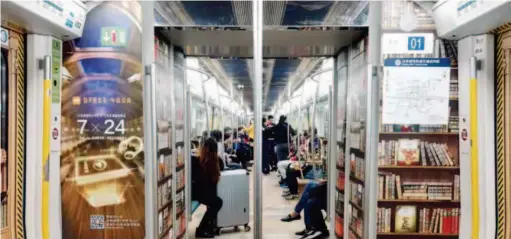  ?? VCG ?? In October 2017, Igetget launched an audio book house on Beijing's subway line 4. Passengers can scan the QR code on the special subway train “Listen to a Book Everyday” to get a free seven-day VIP app subscripti­on.