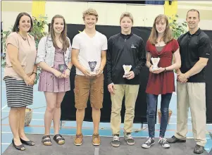  ?? SUBMITTED PHOTO ?? Evangeline School principal Paulette LeBlanc and athletic director Jason Arsenault congratula­te the intermedia­te students and athletes of the year. From second left: Emily McIsaac, female student of the year; Joel Gallant, male student of the year and...