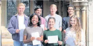  ??  ?? Some of the sixth-form students who collected their A-level results last year