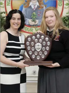  ??  ?? Principal Emma Raughter presents Eibhlin Laffan Downes with the Sports Student of the Year Award.