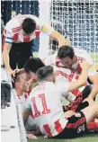  ??  ?? Sunderland players celebrate a goal.