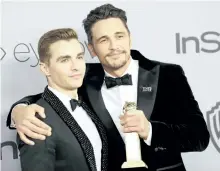  ?? BRIAN TO/WENN.COM ?? James Franco, right, with brother Dave at the Golden Globe Awards on Sunday. Several women have taken to Twitter to accuse the actor of inappropri­ate behaviour.