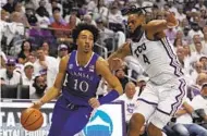  ?? TONY GUTIERREZ AP ?? Kansas forward Jalen Wilson, who had 12 rebounds, works to the basket Monday against TCU’s Eddie Lampkin Jr.