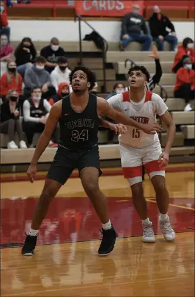  ?? PAUL DICICCO — FOR THE NEWS-HERALD ?? Mentor’s Jonah Waag vies for rebounding position against Medina on Feb. 4.