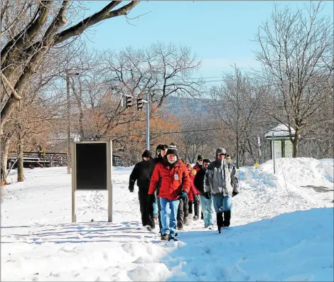  ?? MEDIANEWS GROUP FILE PHOTO ?? A group of eventgoers take part in a previous New Year’s Day hike at Peebles Island State Park.