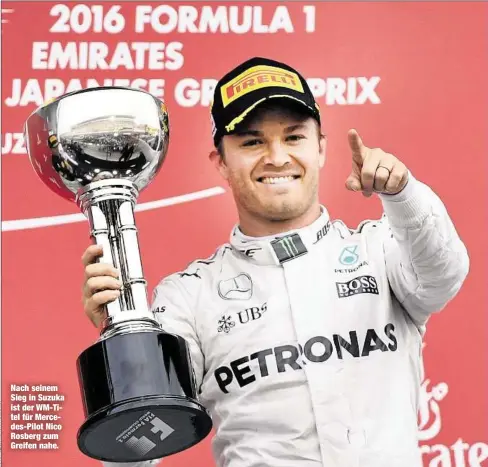 ??  ?? Nach seinem Sieg in Suzuka ist der WM-Titel für Mercedes-Pilot Nico Rosberg zum Greifen nahe.