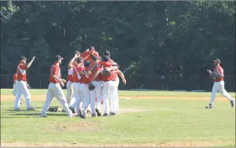  ?? STAFF PHOTO BY TED BLACK ?? Western Charles players celebrate after defeating the Black Sox on Saturday afternoon in the Coors Charles-St. Mary’s Baseball League championsh­ip game, 11-9, at Rainbow Constructi­on Field in La Plata.