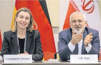  ?? FOTO: AFP ?? Die EU-Außenbeauf­tragte Federica Mogherini und Irans Außenminis­ter Mohammad Dschawad Sarif in Lausanne.