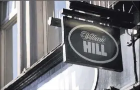  ?? Heidi Fang Las Vegas Review-Journal @HeidiFang ?? One of the William Hill sports books is located on Tottenham Court Road in London. The company was establishe­d in 1934 when gambling was illegal.
