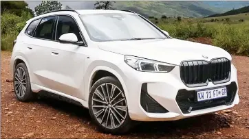  ?? ?? There is no denying the fact that if you, as an auto maker, want to survive in the mainstream market, you need a crossover. (R) The interior of the BMW X1 crossover.