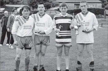  ?? B34twe05 ?? Voted joint footballer­s of the year in a ballot by all league players were, left, Jamie Macpherson and Adi (Donald) Adamson, while sharing the young footballer of the year trophy are Gregor Small and Ian Cook.