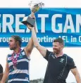  ??  ?? WINNING TEAM: Brad Cooper (right) and Crocs’ Kye Chapple lift the premiershi­p cup.