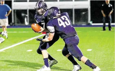  ?? Matthew White / For the Chronicle ?? Emery quarterbac­k David Kleban, left, and Cole Caress are two key players returning for the Jaguars.