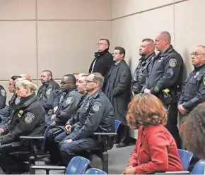  ?? MICHAEL SEARS / MILWAUKEE JOURNAL SENTINEL ?? Milwaukee police officers watch the proceeding­s as Jordan P. Fricke appears in intake court on Sunday, charged in the murder of Milwaukee Police Officer Matthew Rittner.