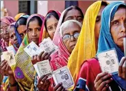  ??  ?? Voters queue up to cast their votes at a polling station during the fourth phase of the Assembly elections of Uttar Pradesh, in Allahabad, earlier this year.