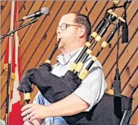  ?? SUBMITTED PHOTO ?? Piper Keith MacDonald provides some music at the Big Pond Concert last week.