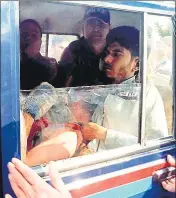  ?? HT PHOTO ?? Police rush Devpal to hospital, in Ramnagar on Monday.