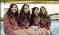  ?? STAN HUDY/THE SARATOGIAN ?? Saratoga Springs swimmers and divers Madeline Wood, Rachel Wood, Renee Maslak and Adelle Feeley hang out on the board at Skidmore College Wednesday afternoon.