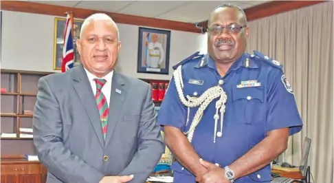  ?? Photo: Office of the Prime Minister ?? Prime Minister Voreqe Bainimaram­a and newly-appointed acting Police Commission­er Rusiate Tudravu at the Office of the Prime Minister in Suva on August 3, 2020.