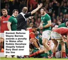  ??  ?? Denied: Referee Wayne Barnes awards a penalty to Wales after Robbie Henshaw illegally helped Rory Best over the line