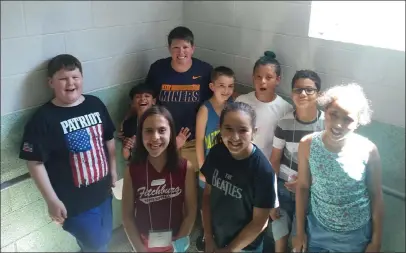  ?? Courtesy sally cragin ?? tara sweeney, rear middle, is joined by fourth grade stem Junior ambassador­s at the Fitchburg public schools summer program, including, front row from left: makenzie Witkowski, olivia reynolds, malaila Harrison. Back row from left: Bryce schumoker, yasir aljumali, Jacobe Kutler, osvaldo Quiles and Fabrizio davilla.