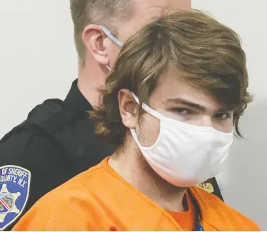  ?? BRENDAN MCDERMID / REUTERS ?? Payton S. Gendron appears in court on Thursday, where he was indicted by a grand jury in the live-streamed supermarke­t shooting in a Black neighbourh­ood of Buffalo, N.Y., last Saturday that saw 10 people killed.