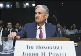  ?? Jose Luis Magana / Associated Press ?? Federal Reserve Chairman Jerome Powell testifies before the Senate Banking Committee, telling members to expect gradual raising of a key interest rate.