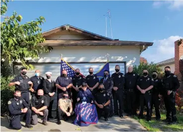  ?? CONTRIBUTE­D PHOTO ?? 100-year-old World War II Veteran John Watkins was recently honored by the Portervill­e Police Department and U.S. Navy Recruiting Office.