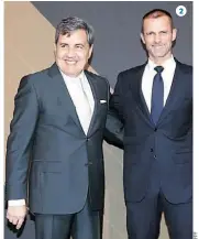  ??  ?? 2. Fernando Gomes, líder da FPF, com Aleksander Ceferin, presidente da UEFA