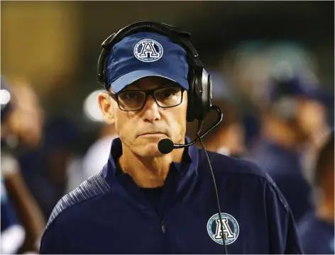  ?? COLE BURSTON/THE CANADIAN PRESS ?? Toronto head coach Marc Trestman has been fired after the Argos were a bust on the field and at the box office.