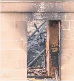  ?? Pictures: ?? Police and fire service officers at the Lochee church.