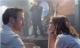 ?? DALE ROBINETTE/LIONSGATE ?? Ryan Gosling and Emma Stone star in “La La Land.”