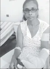  ??  ?? The wounded Savitree Sankumar in her hospital bed yesterday