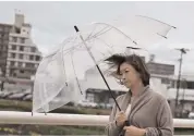  ??  ?? A pedestrian holds an umbrella as rain falls in Morioka, Iwate ahead of Typhoon Hagibis' expected landfall on Saturday.