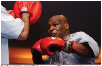  ?? (AP file photo) ?? Former heavyweigh­t boxing champion Mike Tyson, shown during a 2006 sparring session, hasn’t announced any plans to return to the ring, though he did suggest on an Instagram post he might make himself available for three- or fourround exhibition­s if the price was right.