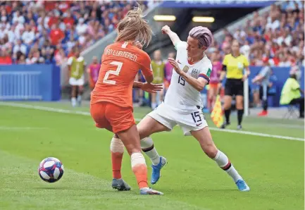  ??  ?? United States forward Megan Rapinoe, right, chases the ball with Netherland­s defender Desiree van Lunteren during the Women’s World Cup final on Sunday in Lyon, France. MICHAEL CHOW/USA TODAY SPORTS