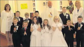  ??  ?? Pupils from Knocknagre­e National School on their First Holy Communion Day. Photo: Eileen O'Connor