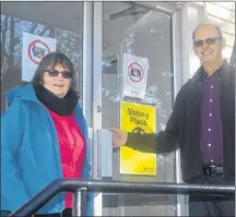  ?? DAVE STEWART/SALTWIRE NETWORK ?? Jim and Diane Farquharso­n of Charlottet­own were two of many people who cast ballots at the advance poll on Monday at the Sherwood Recreation Hall. The next advance poll is on Friday, with election day taking place on Monday, Nov. 5.